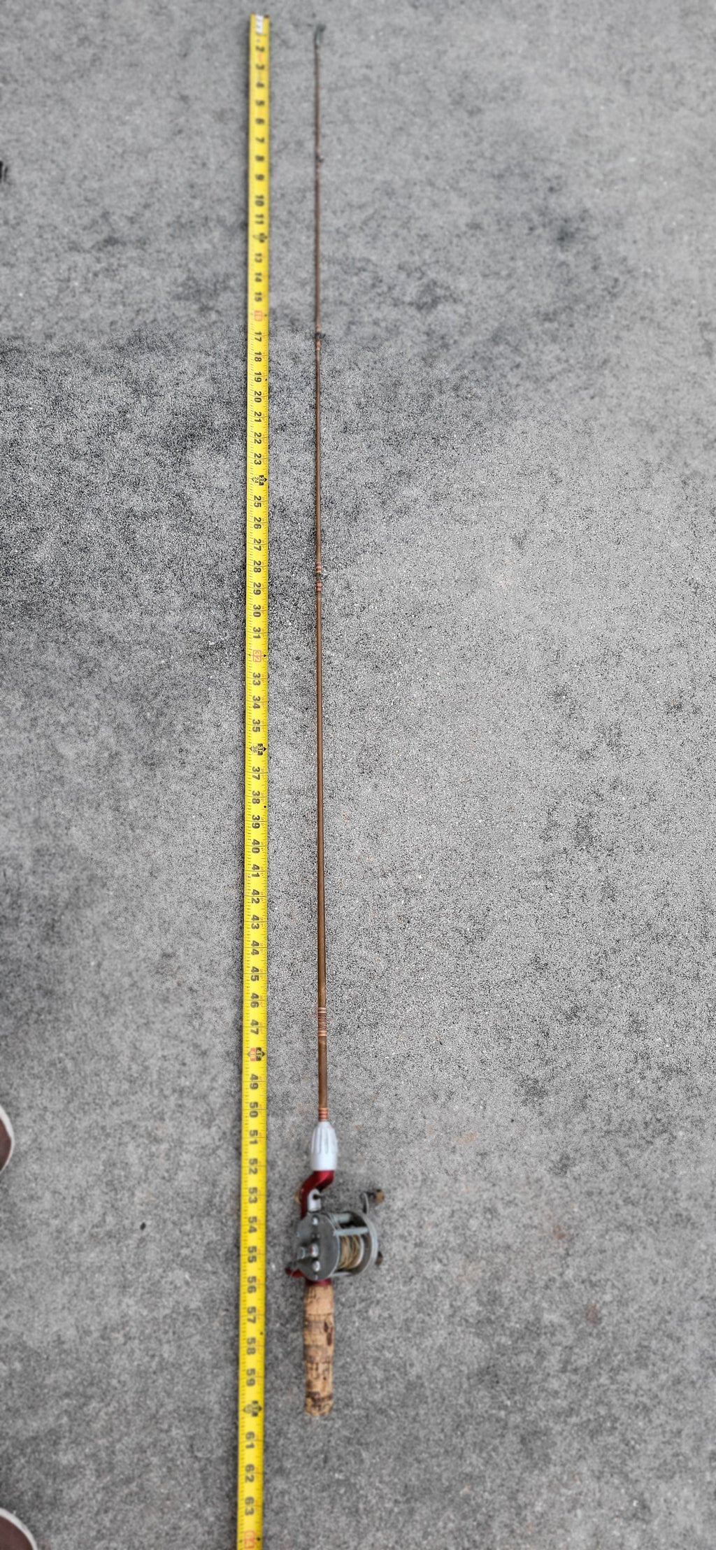 Vintage Fishing Reel and Solid Glass Rod. Montgomery Ward No. 69 6310 Model 5B Reel.  5 ft total length of Rod. Reel Made by Shakespeare.