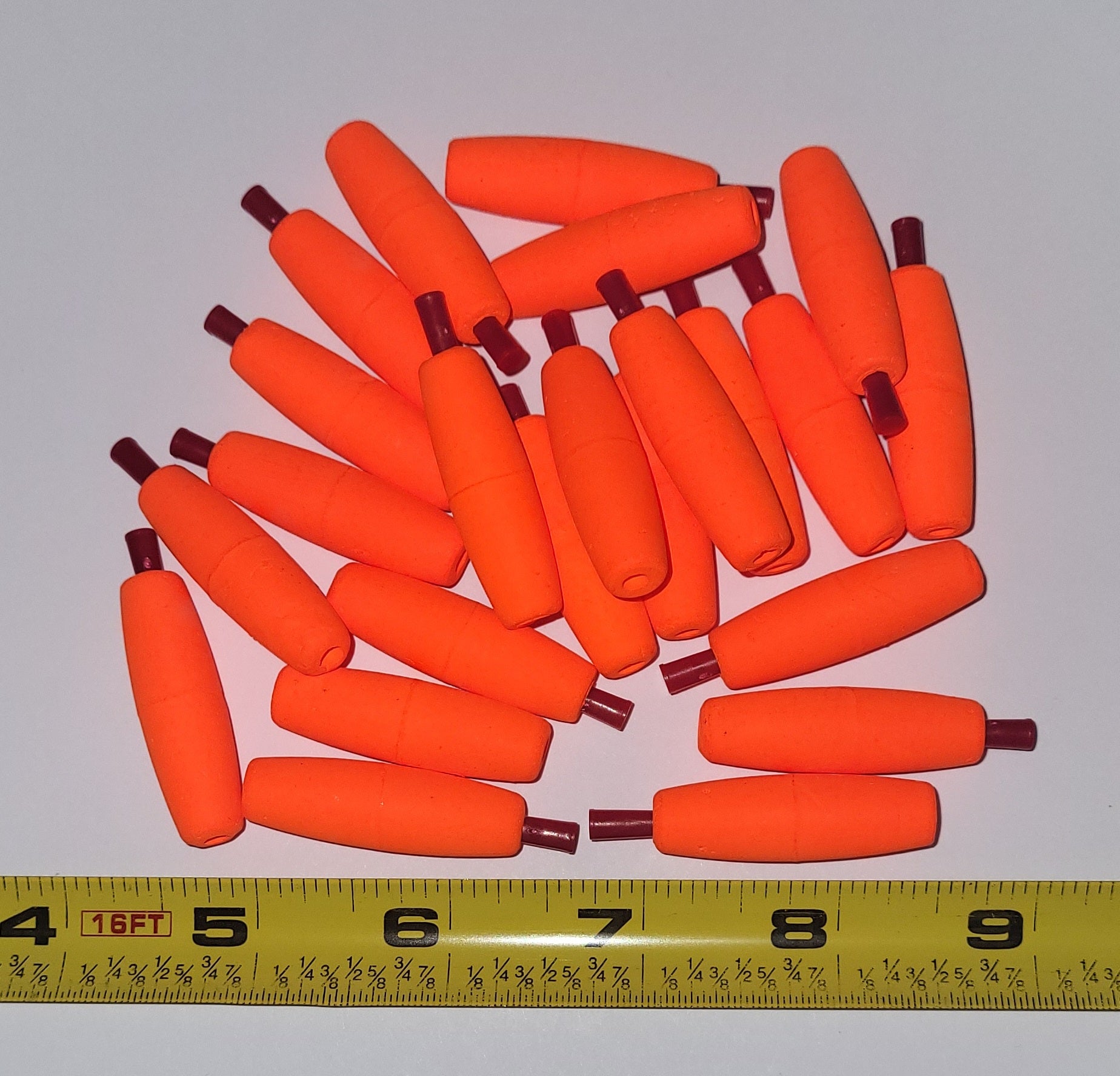 24 of the 1-1/2 inch Slim, Small Diameter, Bright Orange, Cigar Styrofoam Float, Solid Peg