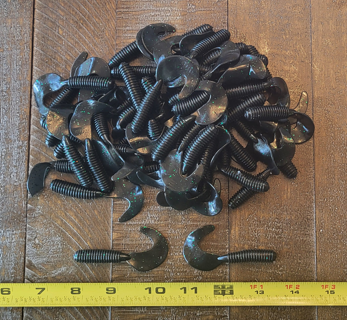 48 pcs, Dark Smoke Black with Green Glitter Color 2-3/4 in lengthy x 3/8 in diameter Large Body Soft Plastic Curl Tail Grubs